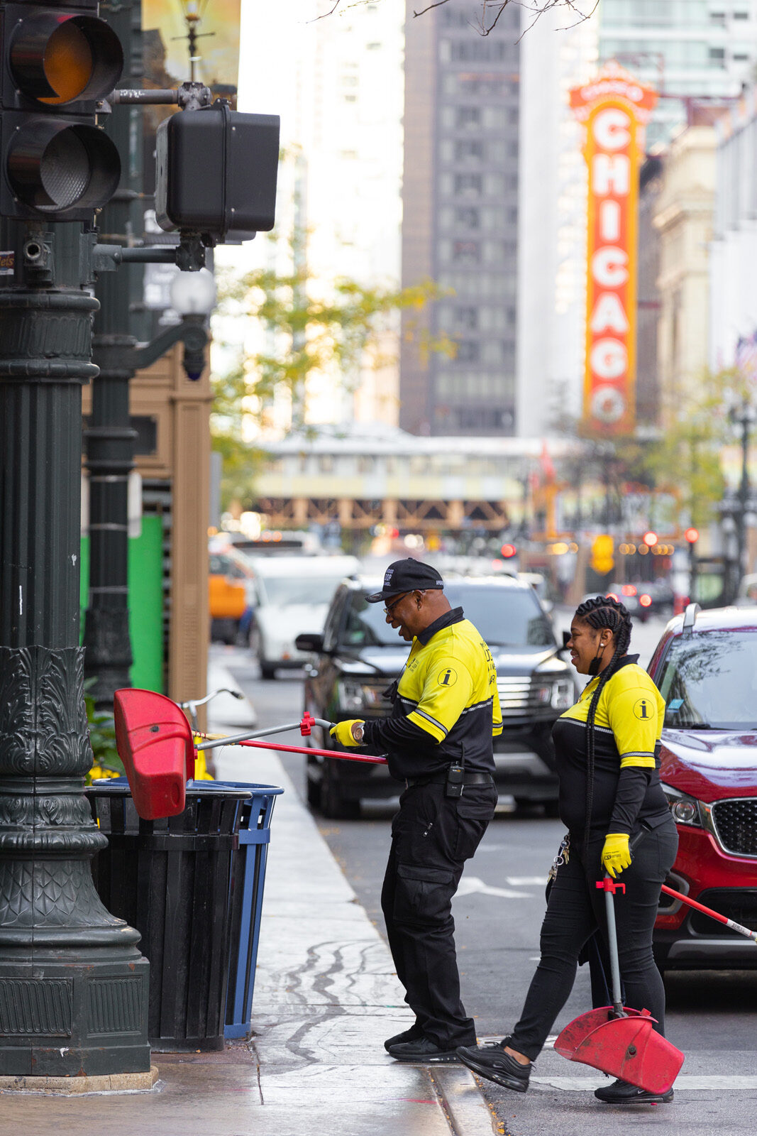 Chicago Loop Alliance Street Team Ambassador sweeping - photo by Adam Alexander
